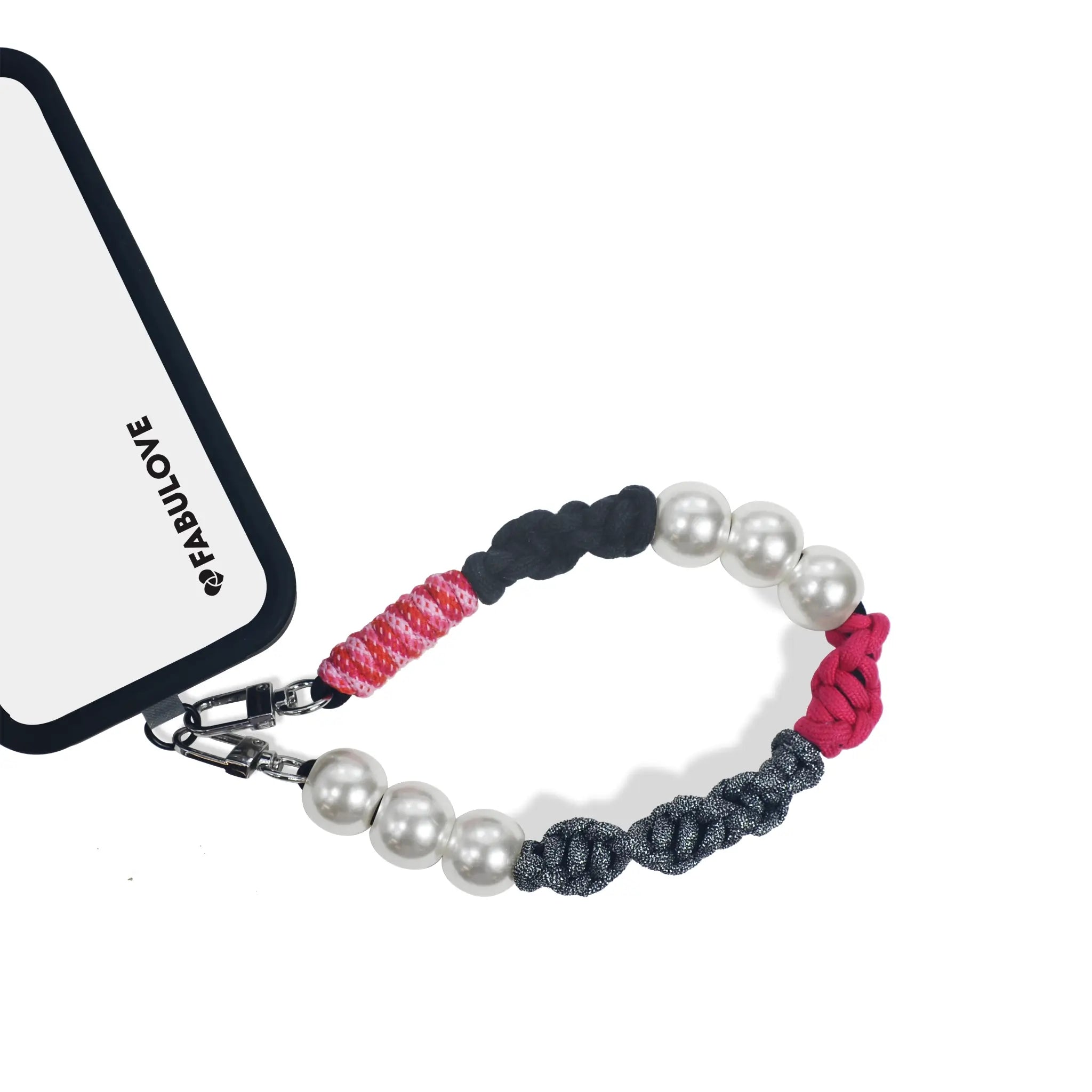 Auren phone strap secured to phone case via strap card for practicality