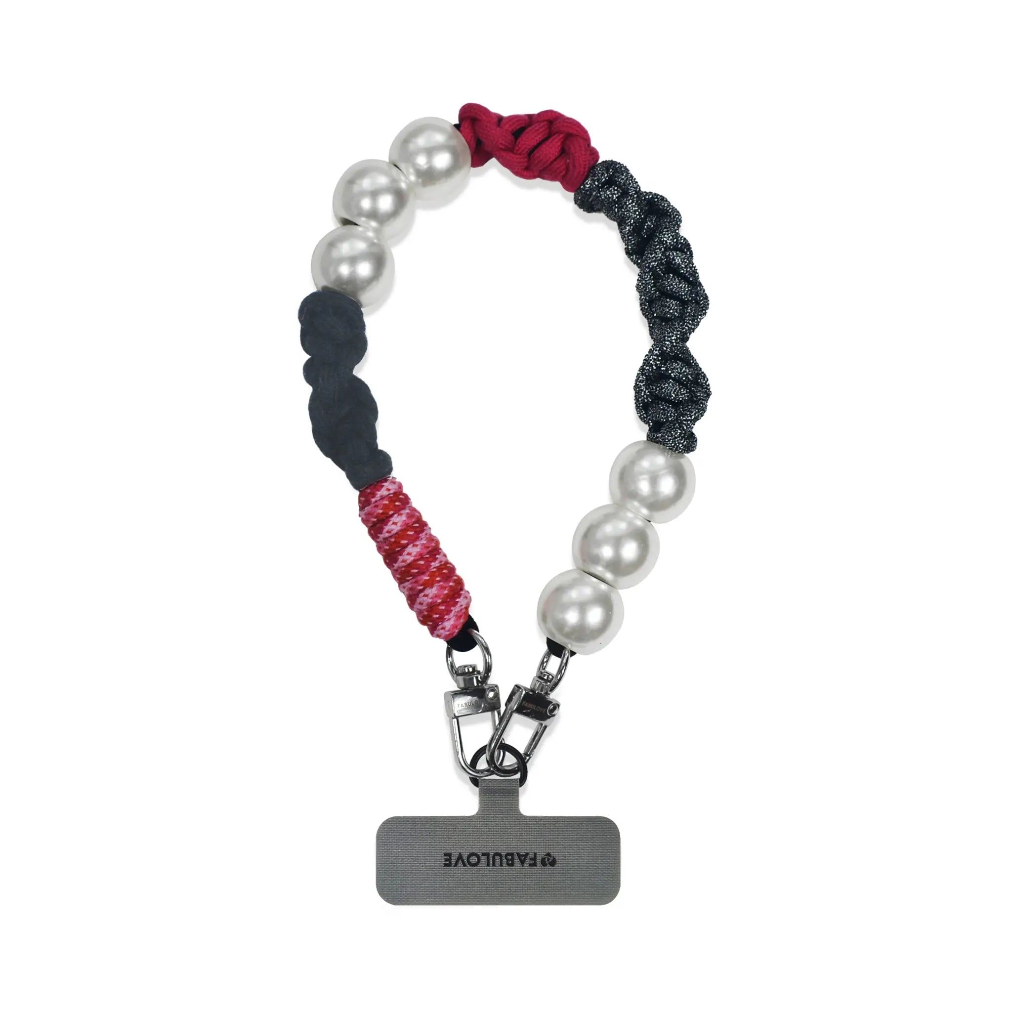 Auren hand-braided wristlet hanging with strap card in natural light