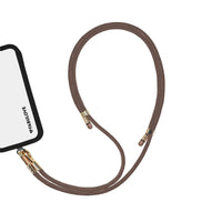 Adjustable Caramel Brown phone crossbody strap at iPhone charging port