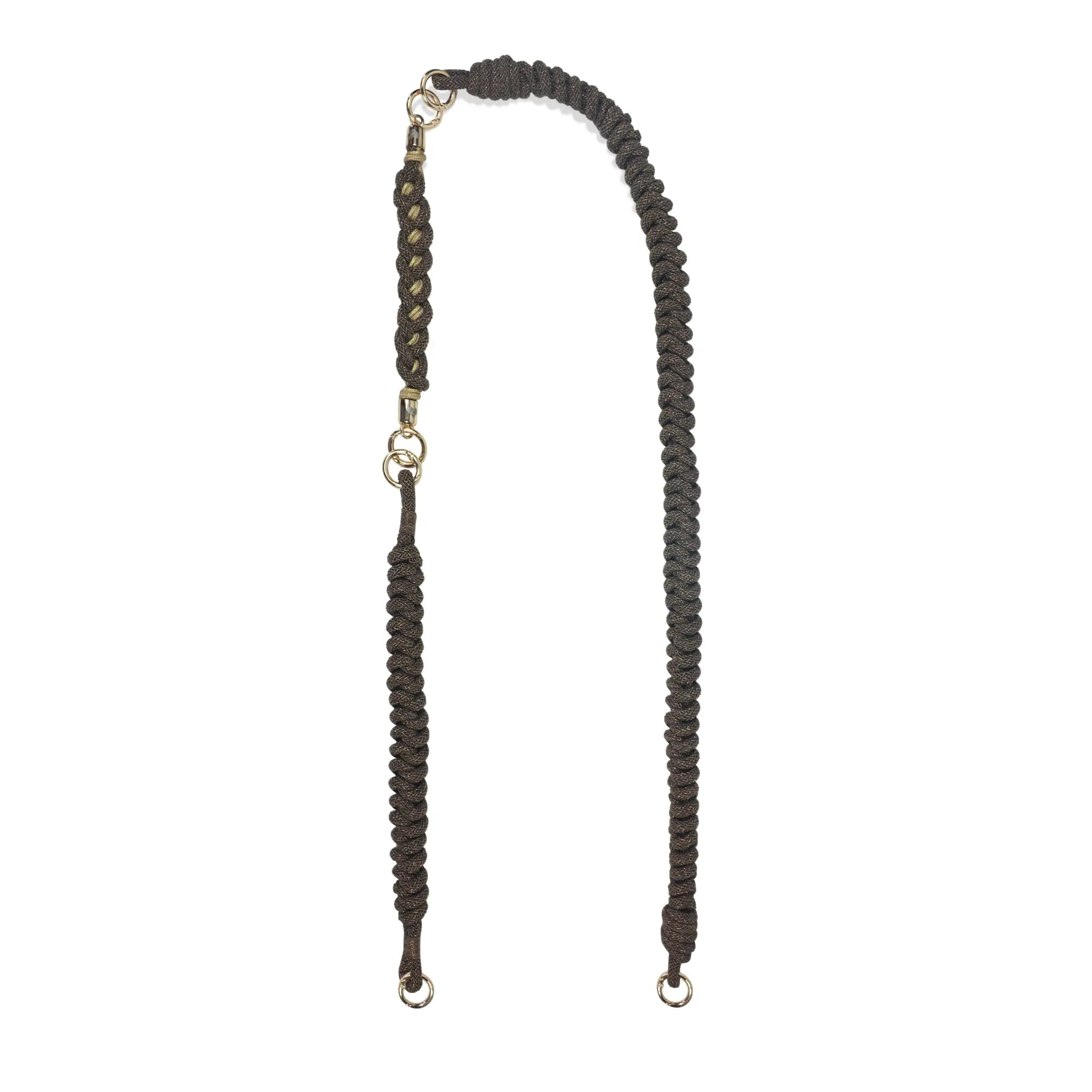 Caramel brown strap components separated: long shoulder carrier, wristlet safety band and keychain strap