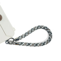 Iceland strap clipped to phone charging port