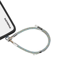 Adjustable Iridescent phone strap connected to iPhone charging port