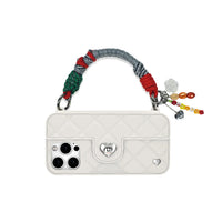 Lyra handle clasped to phone case ears for charm functionality