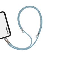 Adjustable peacock blue phone crossbody strap at iPhone charging port