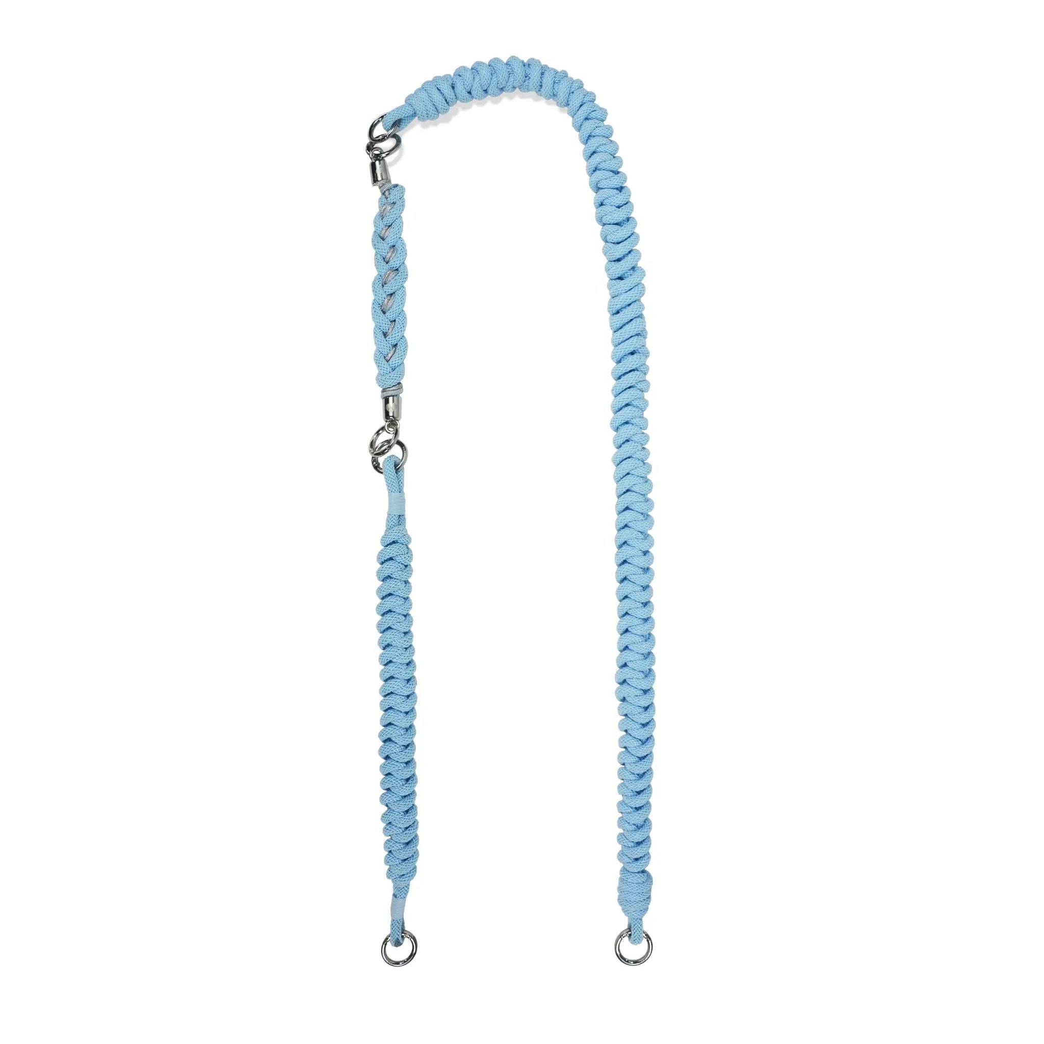 Three peacock blue strap segments arranged with clasps unattached: shoulder, wrist and handle sizes ready to combine