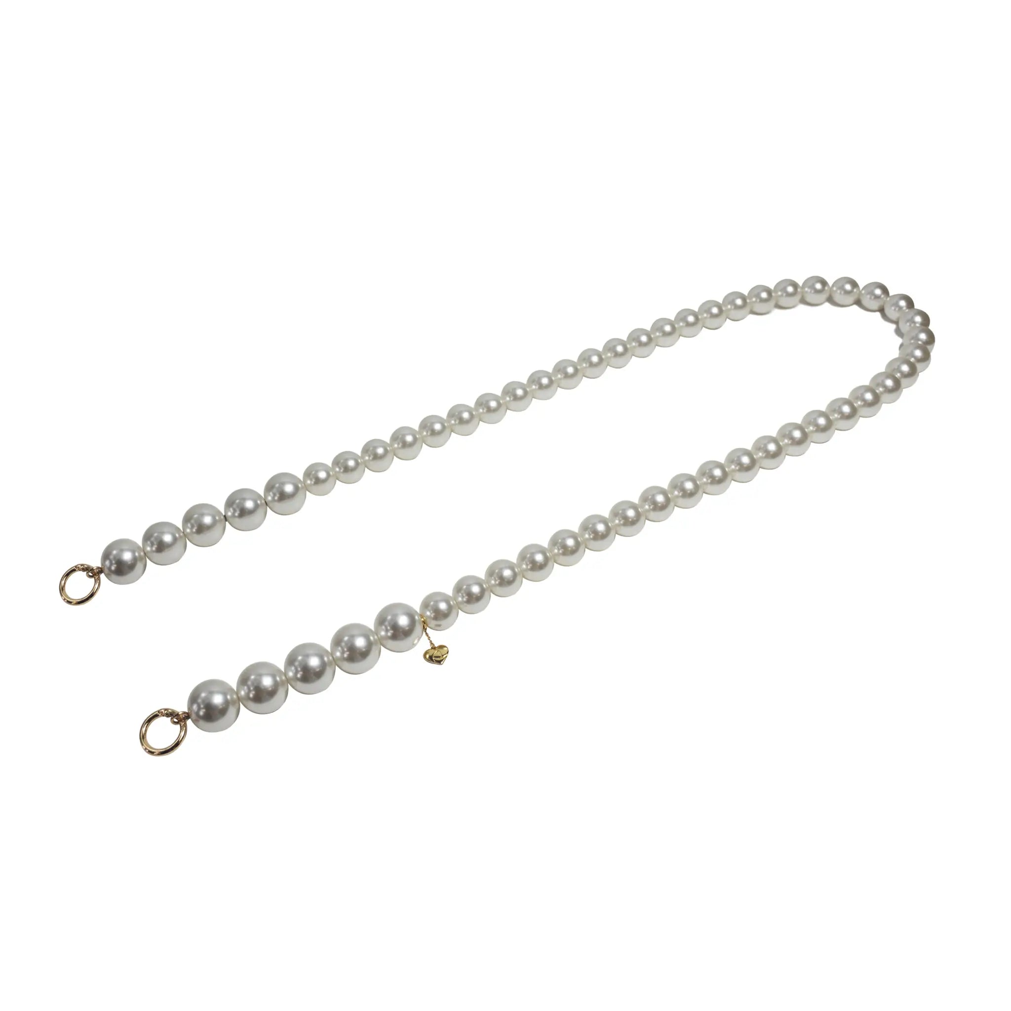 Side view of elegant pearl rope strap with separated golden clasps.
