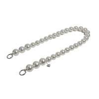 Side view of pearl rope shoulder strap with silver clasps apart.