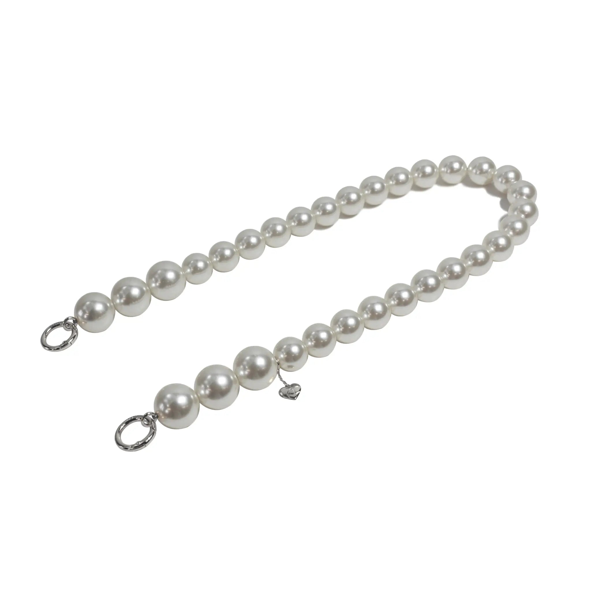 Side view of pearl rope shoulder strap with silver clasps apart.