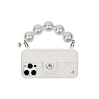 Pearl strap attached to the strap-ready ears as handle