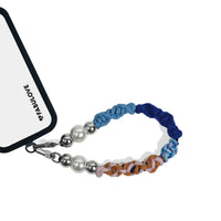 Titan wristlet connected to phone case using strap card for easy access