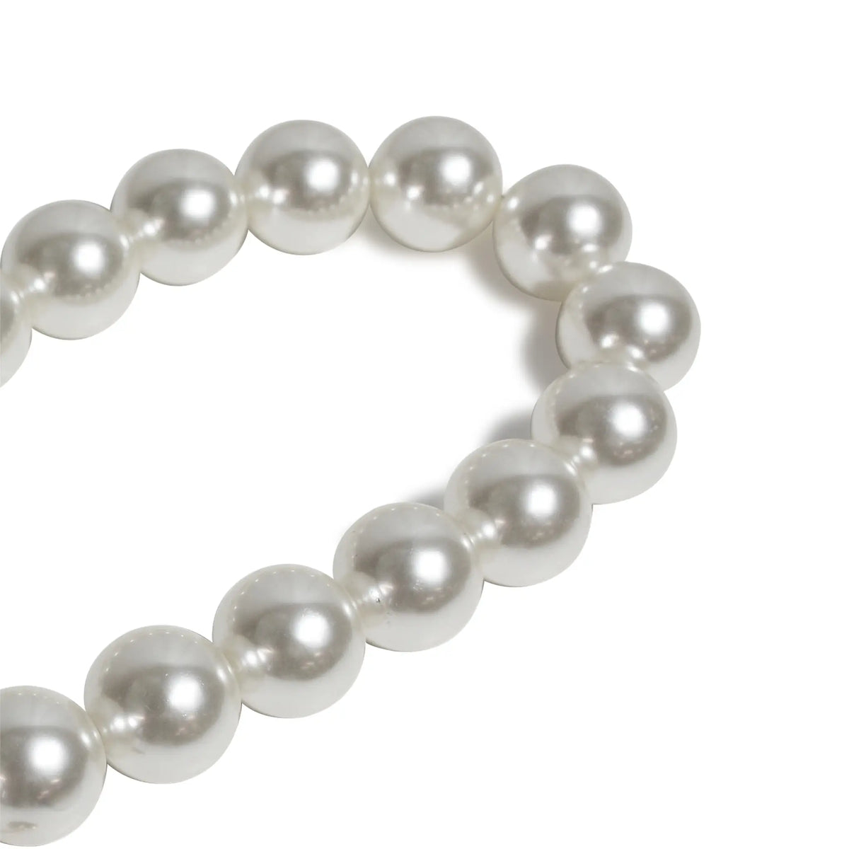 Detailed view of pearl beads on durable wristlet rope strap.