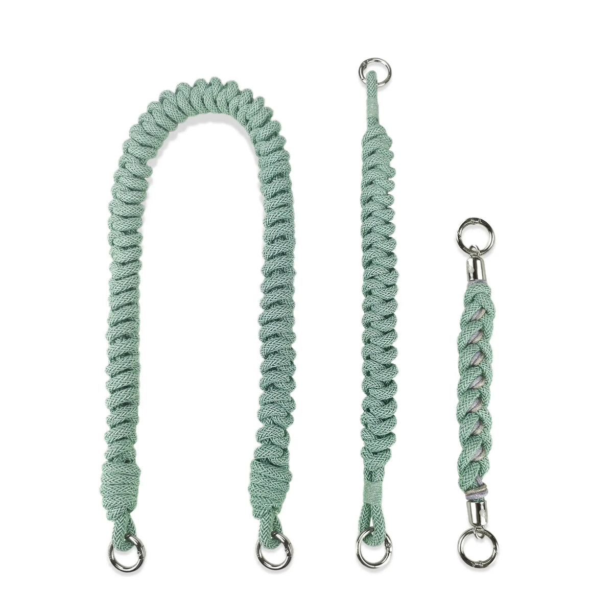 Disassembled mint green straps: Shoulder segment, wrist safety band, handle charm isolated frontal view 